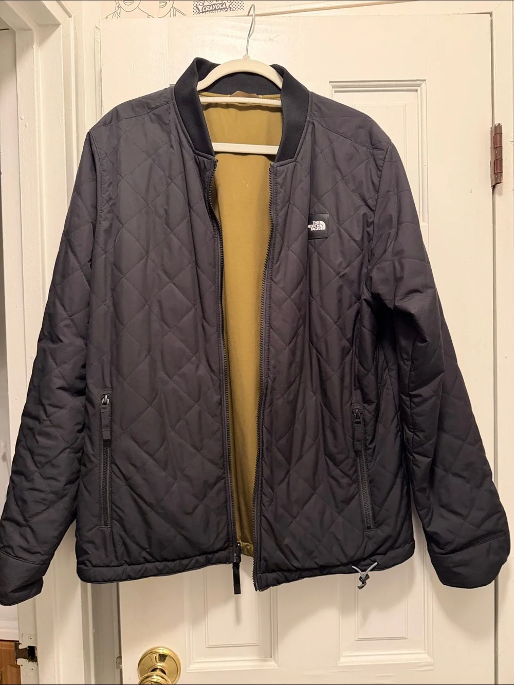 The North Face Men's reversible Black Bomber Jacket with Olive Interior M